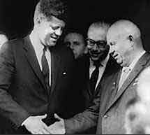 A photo of Kennedy and Khrushchev shaking hands.