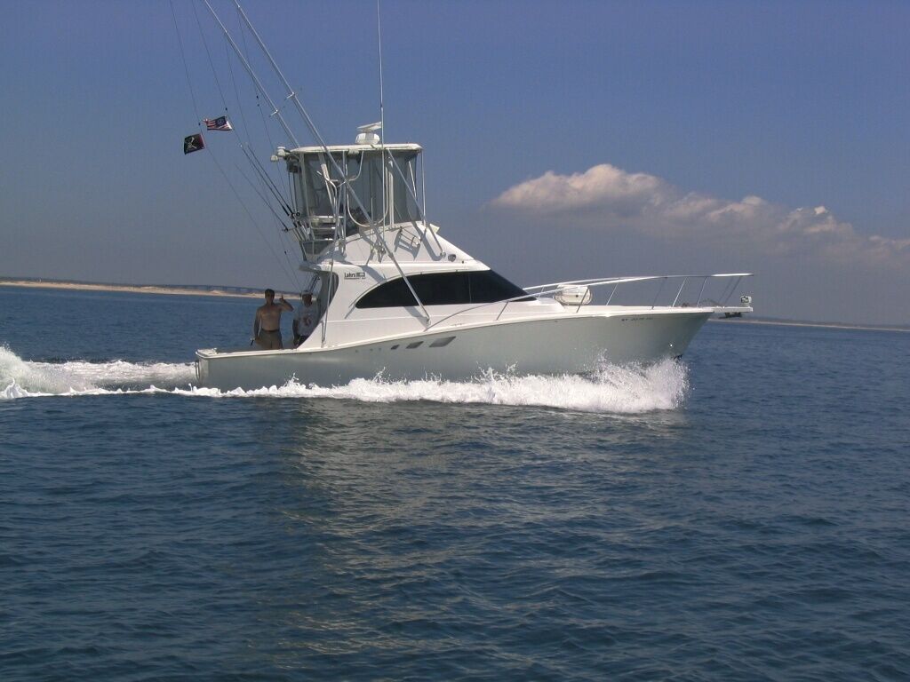 A boat floats in a body of water.