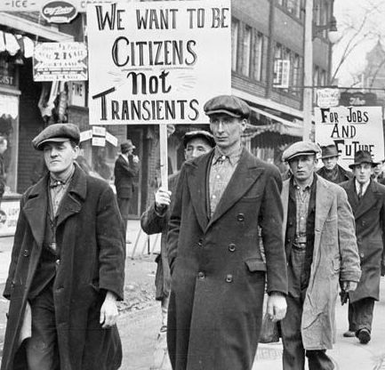 Members of an unemployed workers’ association protesting in the streets of Toronto.