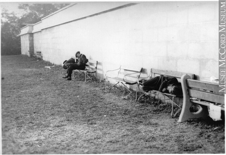 Unemployed people sleeping on park benches.