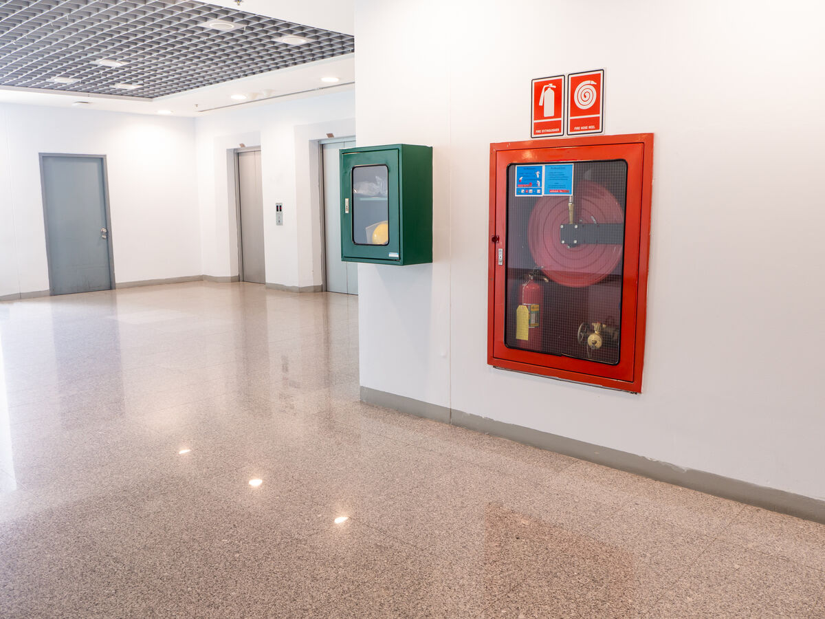 Fire extinguishing cabinet with a glass door