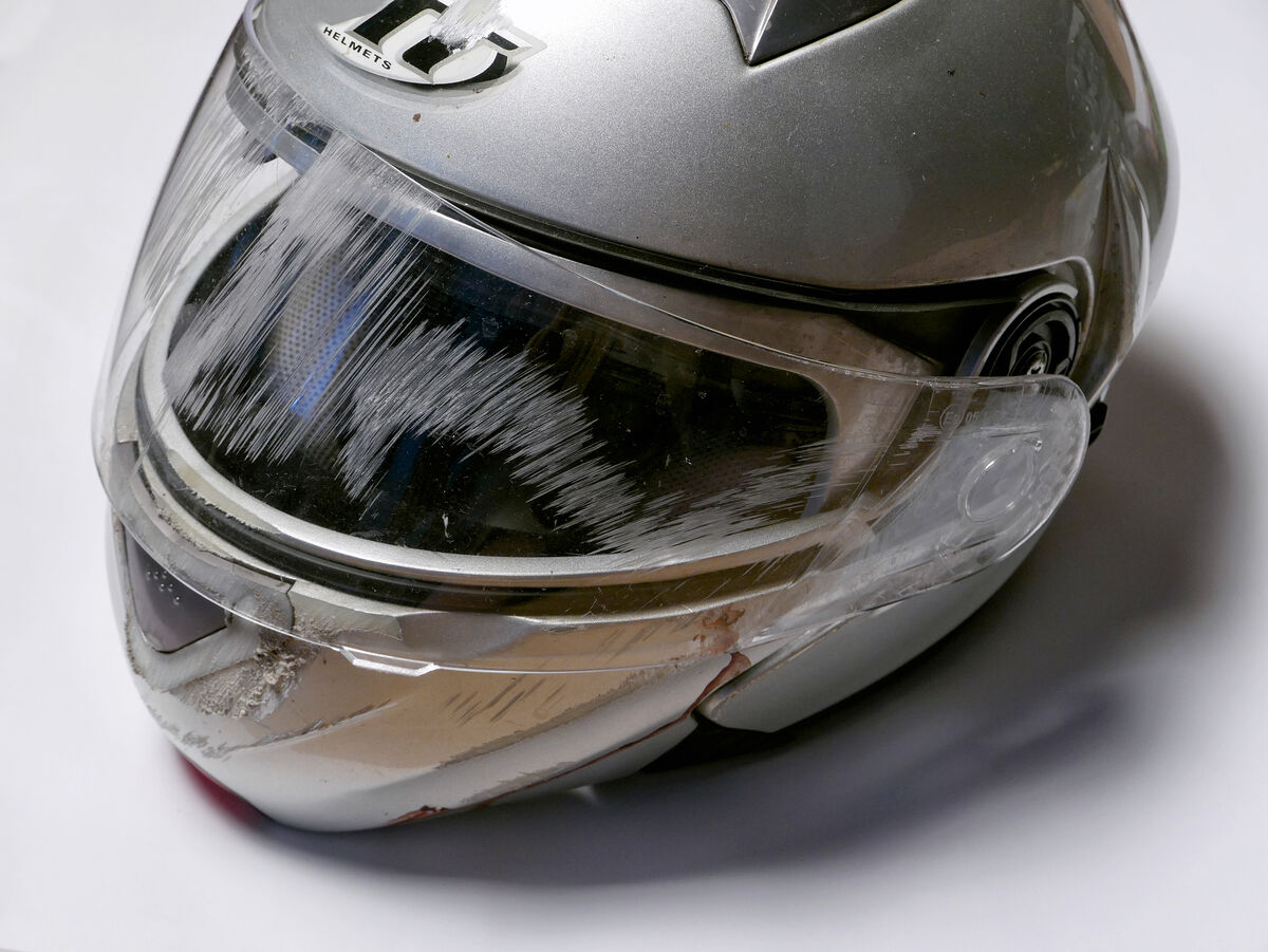 Crashed motorcycle helmet