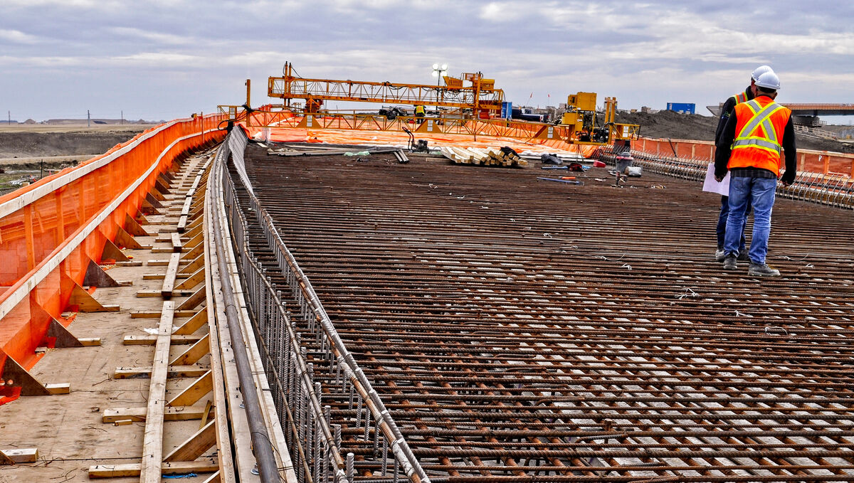 A steel rod structure before concrete is poured into it on a bridge construction site