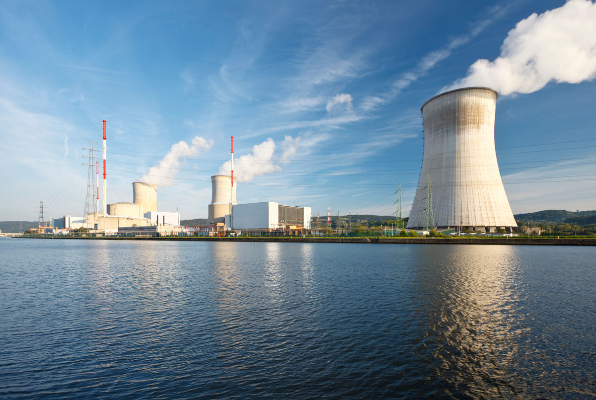 A nuclear power plant on the edge of a river.