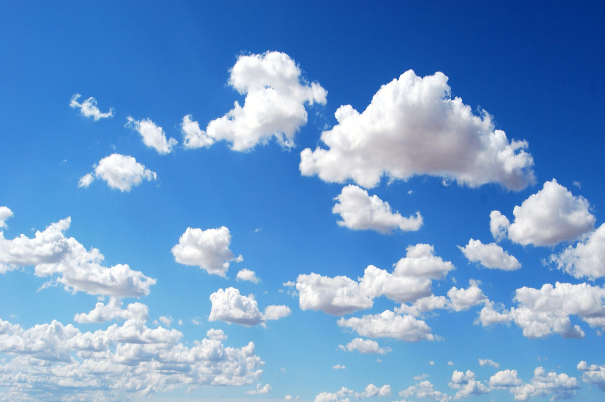 Blue sky with a few clouds.