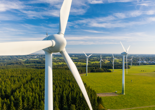 Aerial view of wind turbines and the landscape.