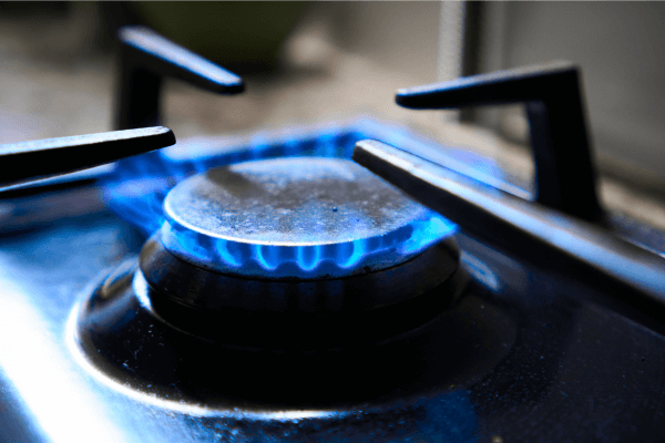 The flame of a propane burner on a gas stove. 