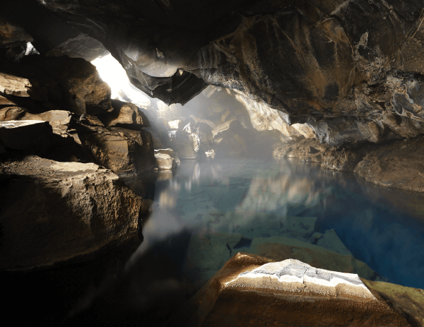 A cave with water.