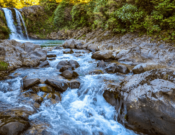 A water stream flowing down a slope.