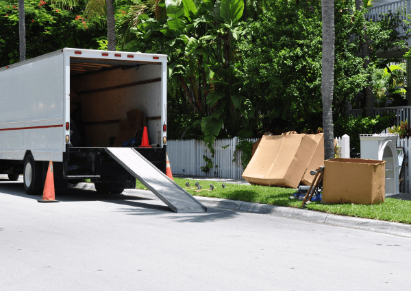 A ramp is used for loading boxes and furniture onto the truck.