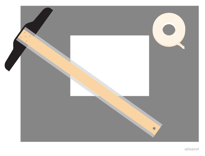 A sheet of white paper, tape, a drawing board and a T-square.