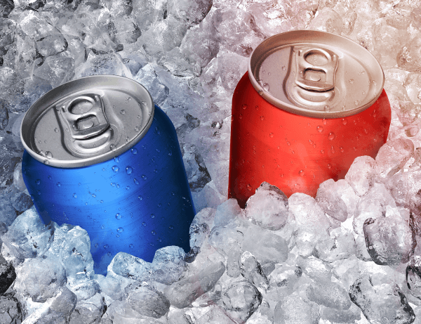 Two aluminum cans in ice.