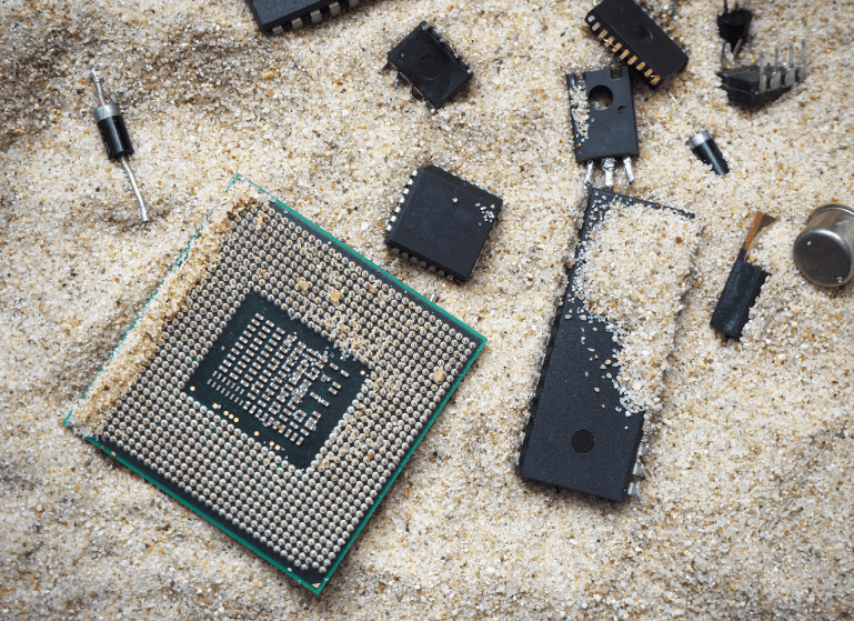 Electronic components in the sand.