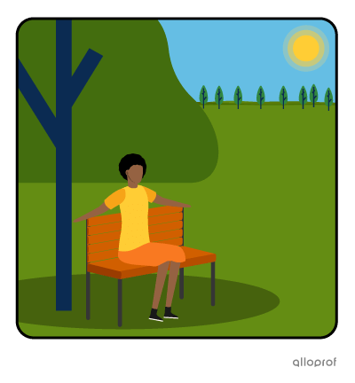 Woman lying in the shade.