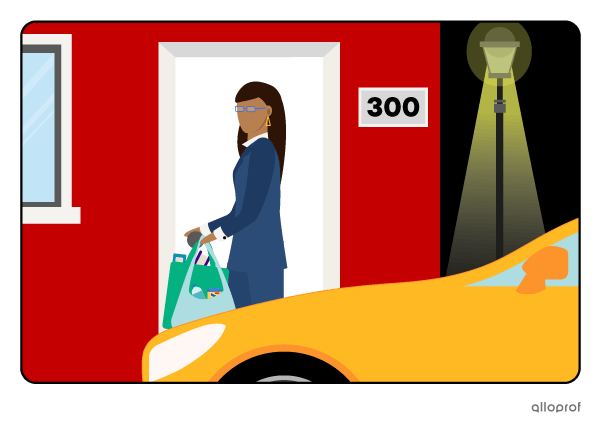 Woman locking her car doors at night.