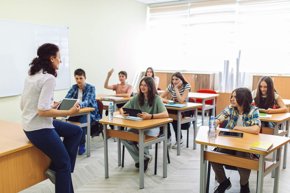 A teacher in class with her students.