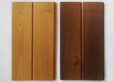 Wood treated by heating its surface to a high temperature.