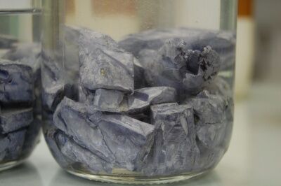 Solid potassium stored in a jar of oil.