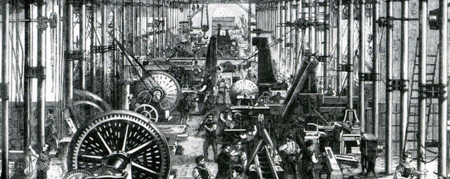 An image of a factory with machines and workers.