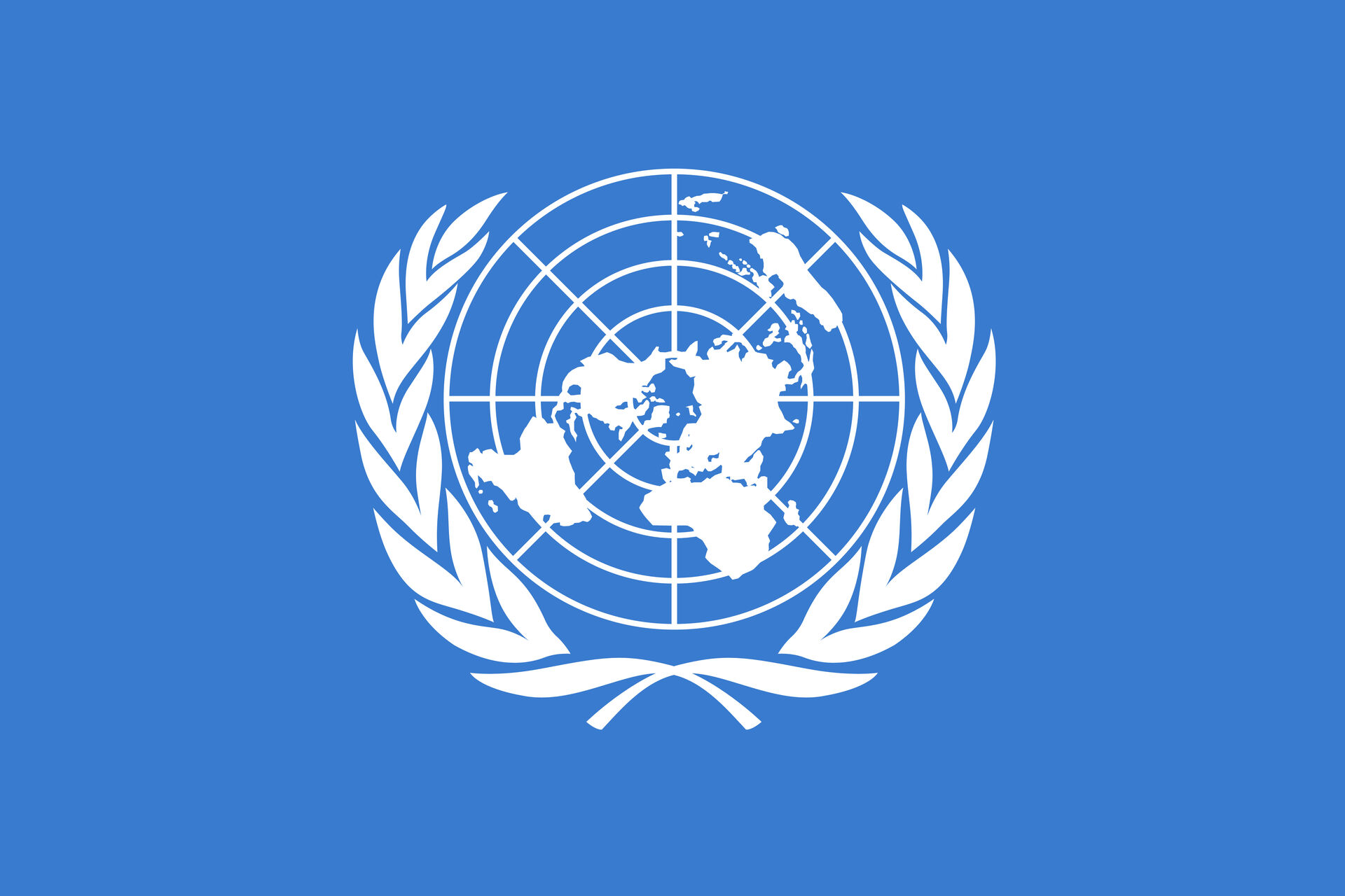 Le fond bleu et les rameaux d'olivier du drapeau de l'ONU symbolisent la paix. 