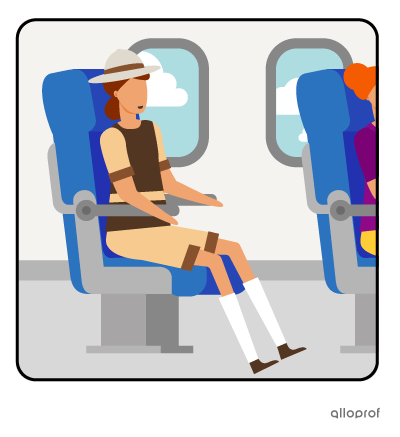 Florence the explorer is sitting on a plane in first class.