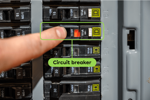 A tripped circuit breaker in an electrical panel.