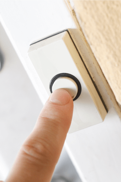 A doorbell button.