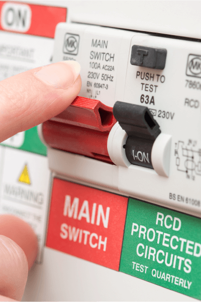 A switch on a circuit breaker board.