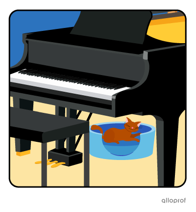 A kitten under a piano.