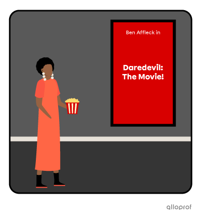 Woman in front of movie posters.