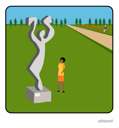 Woman in front of a statue.