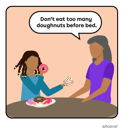 Child eating doughnuts with her grandmother.
